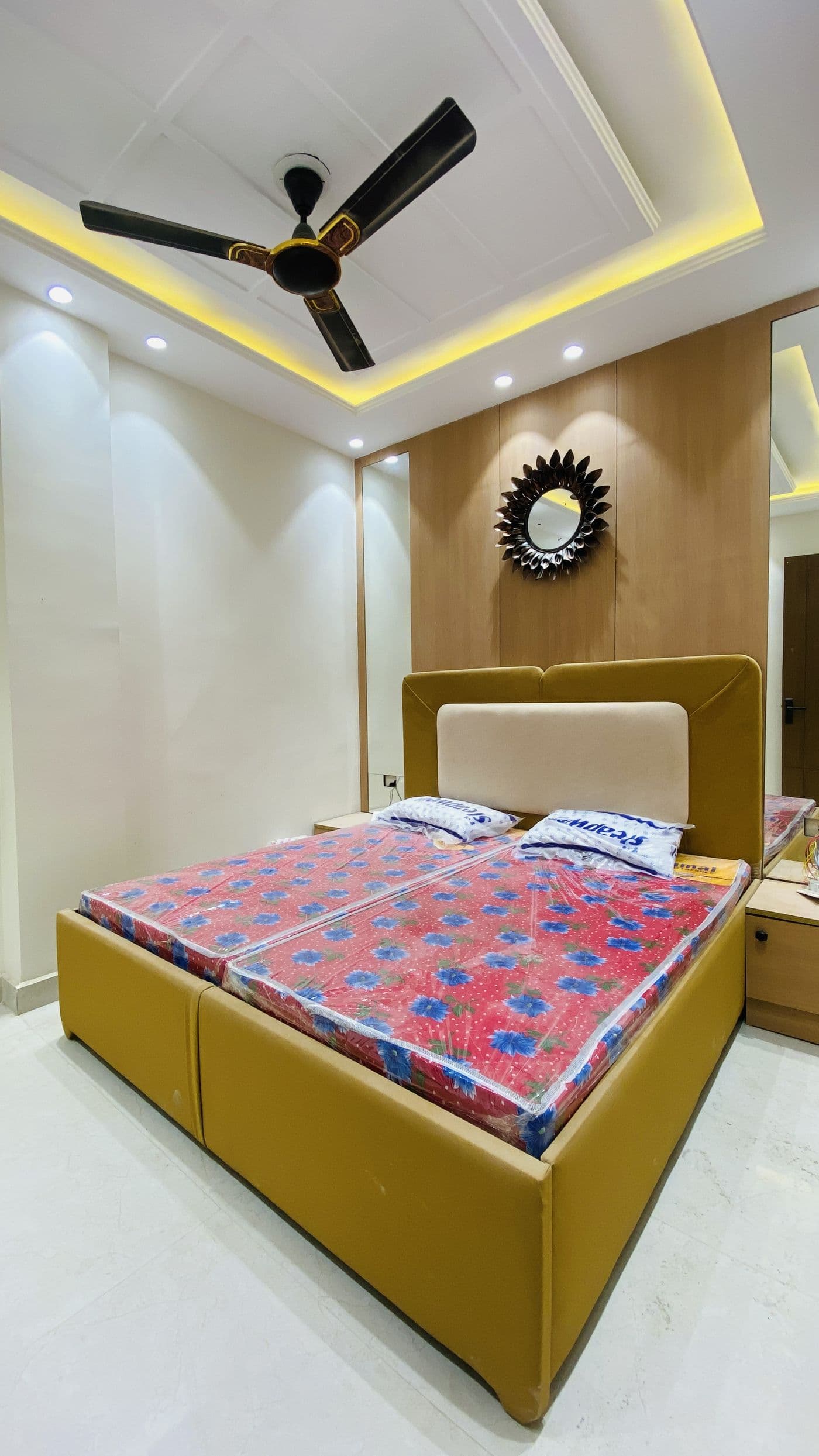 Bedroom with false ceiling and cove lighting