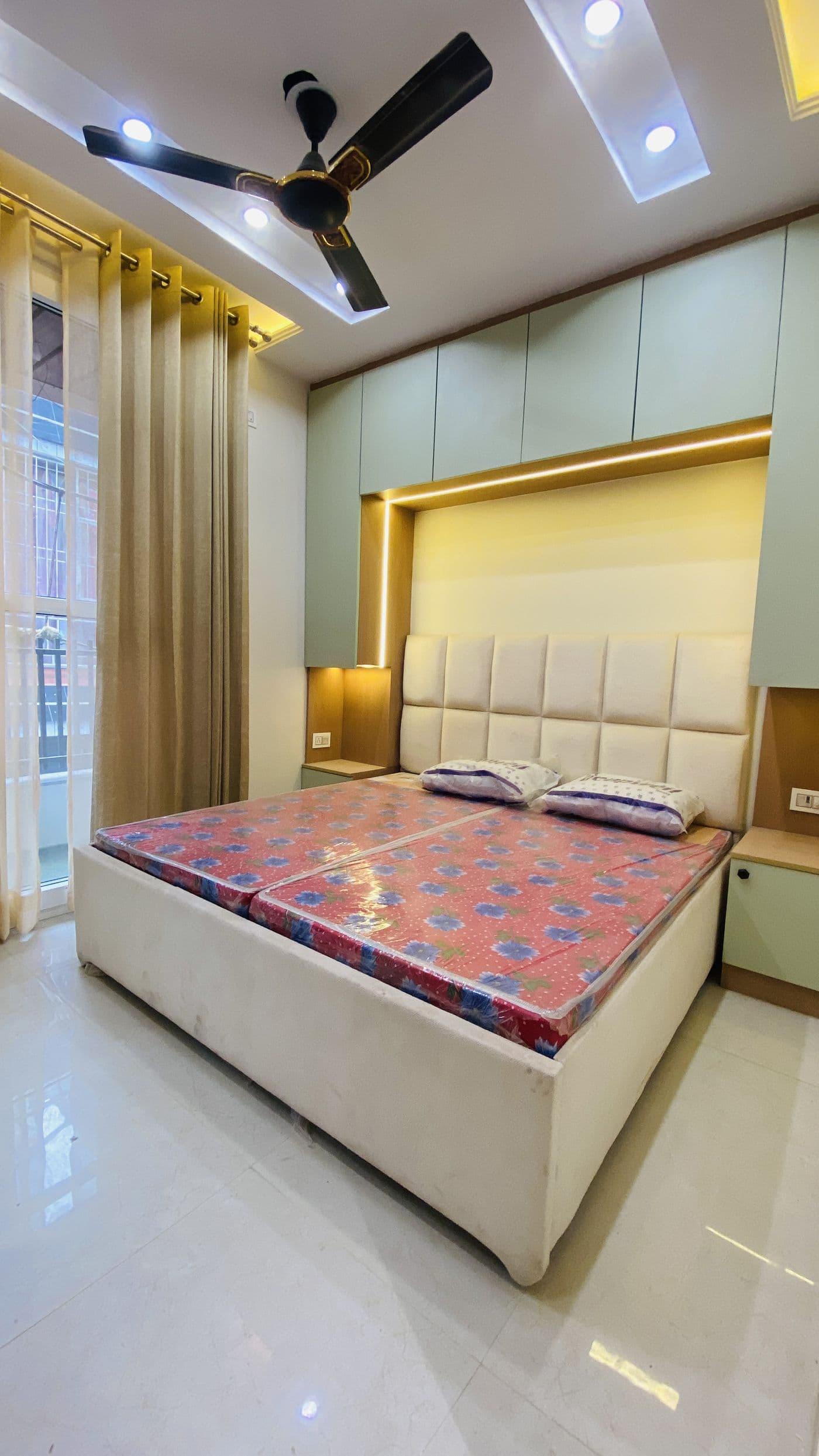 Bedroom with upholstered headboard